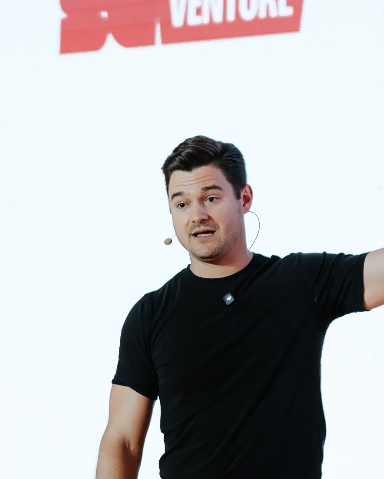 Nathan Latka speaking to the audience at SaaStanak 2026