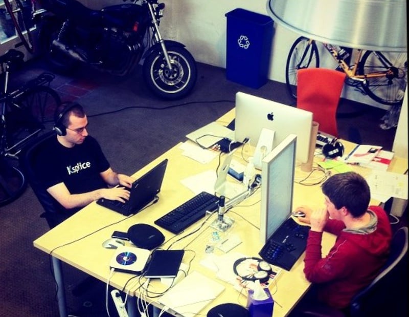 Patrick Collison's Instagram Photo From 2010 of 2 guys working on computers